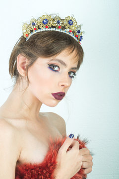 Makeup for woman with soft skin, elegance. Makeup and beauty of young cute woman or girl in luxury crown.