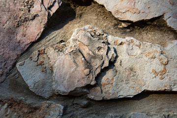 Close up of natural stone wall. Stone wall texture 