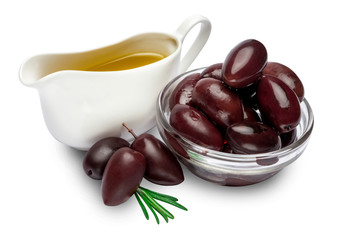 black olives isolated in glass bowl and oil on white background