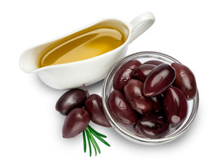 black olives isolated in glass bowl and oil on white background