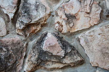 Close up of natural stone wall. Stone wall texture 