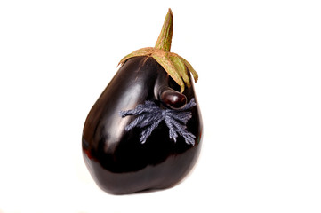 Senor Eggplant. Eggplant with nose and mustache. Funny eggplant isolated on white background. Face shaped Eggplant on white background. Mutant eggplant.