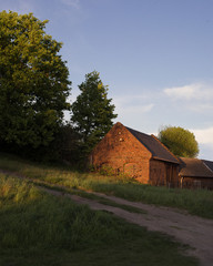 Fototapeta premium Brick house in the sunset