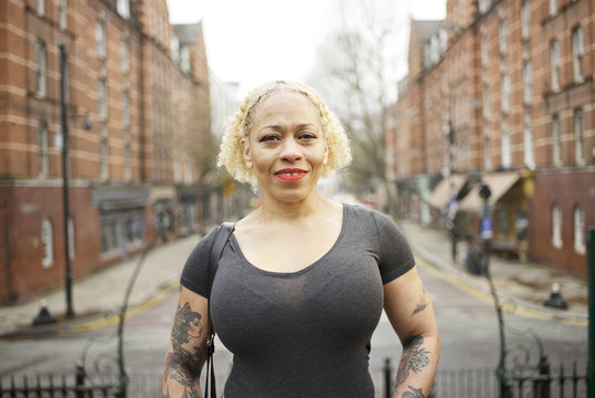 Portrait of a mixed race woman in an urban street