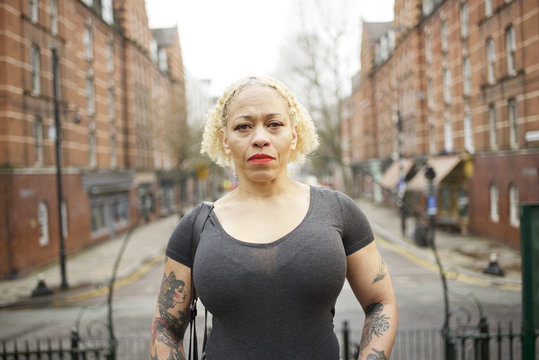 Portrait of a mixed race woman in an urban street