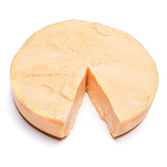 Whole round Head and pieces of parmesan or parmigiano