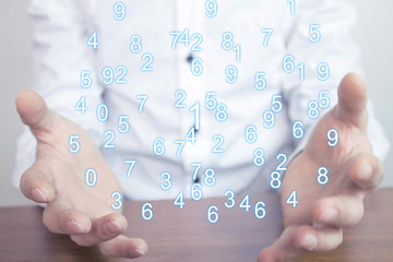 Man holding numbers. Digital information concept