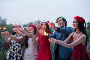 Young people are celebrating New Year's party.
