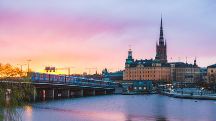 Fototapeta na wymiar Stockholm old town and metro at sunset