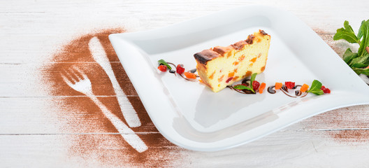 Cheese pudding with fruit. On a wooden background. Top view. Copy space.