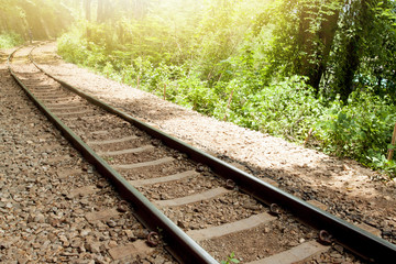 Fototapeta premium Railroad tracks near the cliff of history from World War 2 at Death Railway Kanchanaburi Province Thailand.