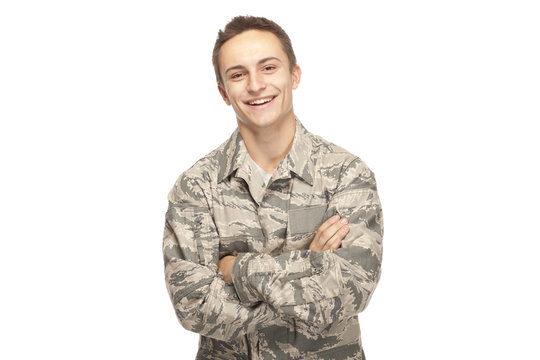 Happy air force airman with arms crossed