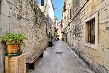 Picturesque medieval street in the old town of Trogir, Croatia