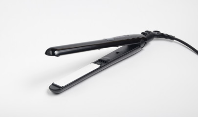 Hair iron on white background.