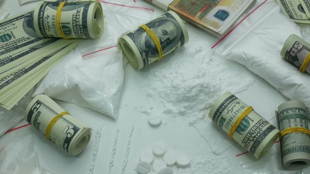 criminal financial profit of the drug cartel from the sale of cocaine and narcotic tablets.