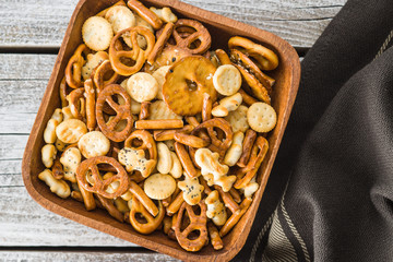 Mixed salty snack crackers and pretzels.
