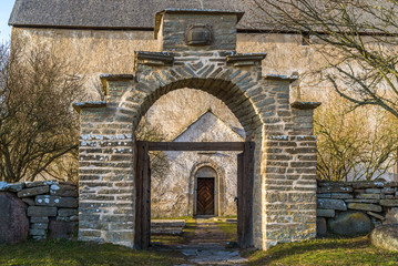 Oland, Sweden. Limestone portal to the Kalla old church from the 12th century. Kalla old church is part of the cultural heritage and was in use up until 1888. Now a historical travel destination.