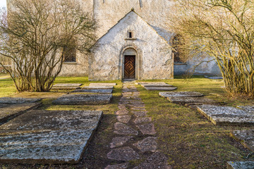 Oland, Sweden. Limestone path to the Kalla old church from the 12th century. Kalla old church is part of the cultural heritage and was in use up until 1888. Now a historical travel destination.