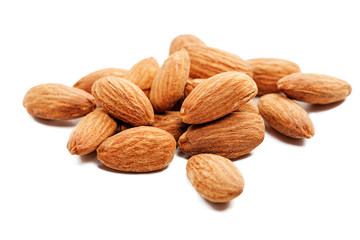 Group of almonds isolated on white.