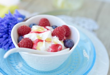 Ice cream with raspberries and blueberries
