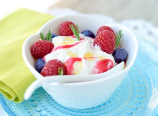Ice cream with raspberries and blueberries