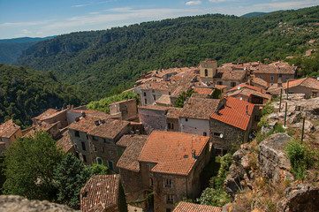 Fototapeta na wymiar Panoramic view of houses and roofs of the village of Chateaudouble, a quiet and tourist village with medieval origin on a sunny day. Located in the Var department, Provence region, southeastern France