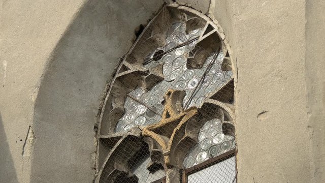 Cusps in an arched window