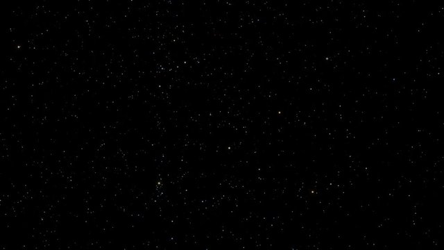 A star field twinkles in a night sky (Loop).
