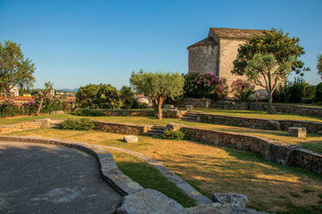 View of the tower clock garden on top of the hill in the light of sunset, over the lively and gracious town of Draguignan. Located in the Var department, Provence region, southeastern France