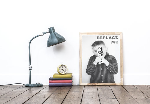 Wood Framed Photo with Books and Lamp Mockup