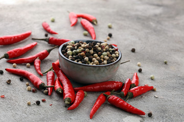 red hot bird chili pepper with pepper corns