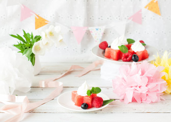 Watermelon stars with berries and ice cream, birthday decoration