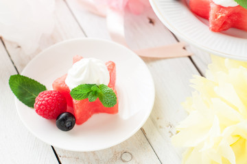 Watermelon stars with berries and ice cream, birthday decoration