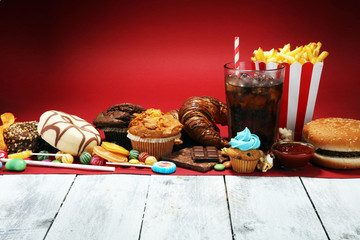 Unhealthy products. food bad for figure, skin, heart and teeth.