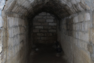 lithoidal walls of medieval cave