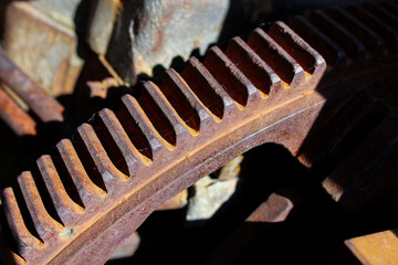 Teeth of ferrous ferruginous cog-wheel of old mechanism