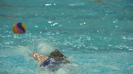 Water Polo Women,  fight for the ball, slow motion tracking shot