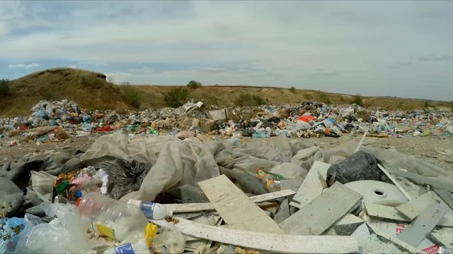 unauthorized dump in a career outside the city. bird's-eye view.
