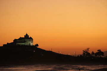 Saquarema - Ita&uacute;na beach with a church in the background