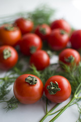 two tomatoes in focus ahead of group