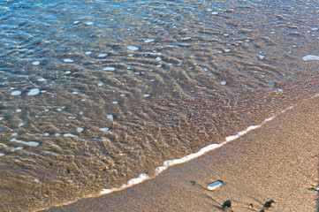 Blue water closeup. Ripples, water background. Small waves in the sea.