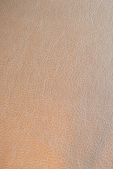 Golden faux leather texture background.