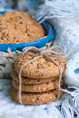 Cookies with sesame and sunflower seeds on plaid. Healthy eating