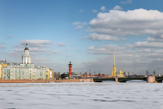 Neva river in winter, Kunstkamera, Palace bridge, Peter and Paul fortress in St. Petersburg