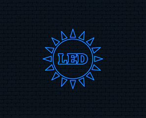 Neon light. Led light sun icon. Energy symbol. Glowing graphic design. Brick wall. Vector