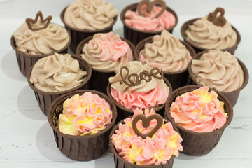 delicious homemade cupcakes with delicate cream