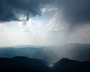 Gray storm windy clouds in mountains