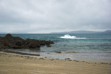 Waves with Cies Islands in the backround, Samil beach, Vigo, Galicia, Spain