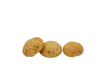 Rolls with sesame and raisin on white background