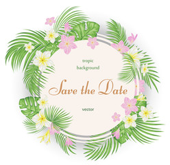 Tropical background with exotic flowers and palm leaves